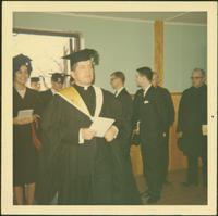 Man in graduation gown and hat